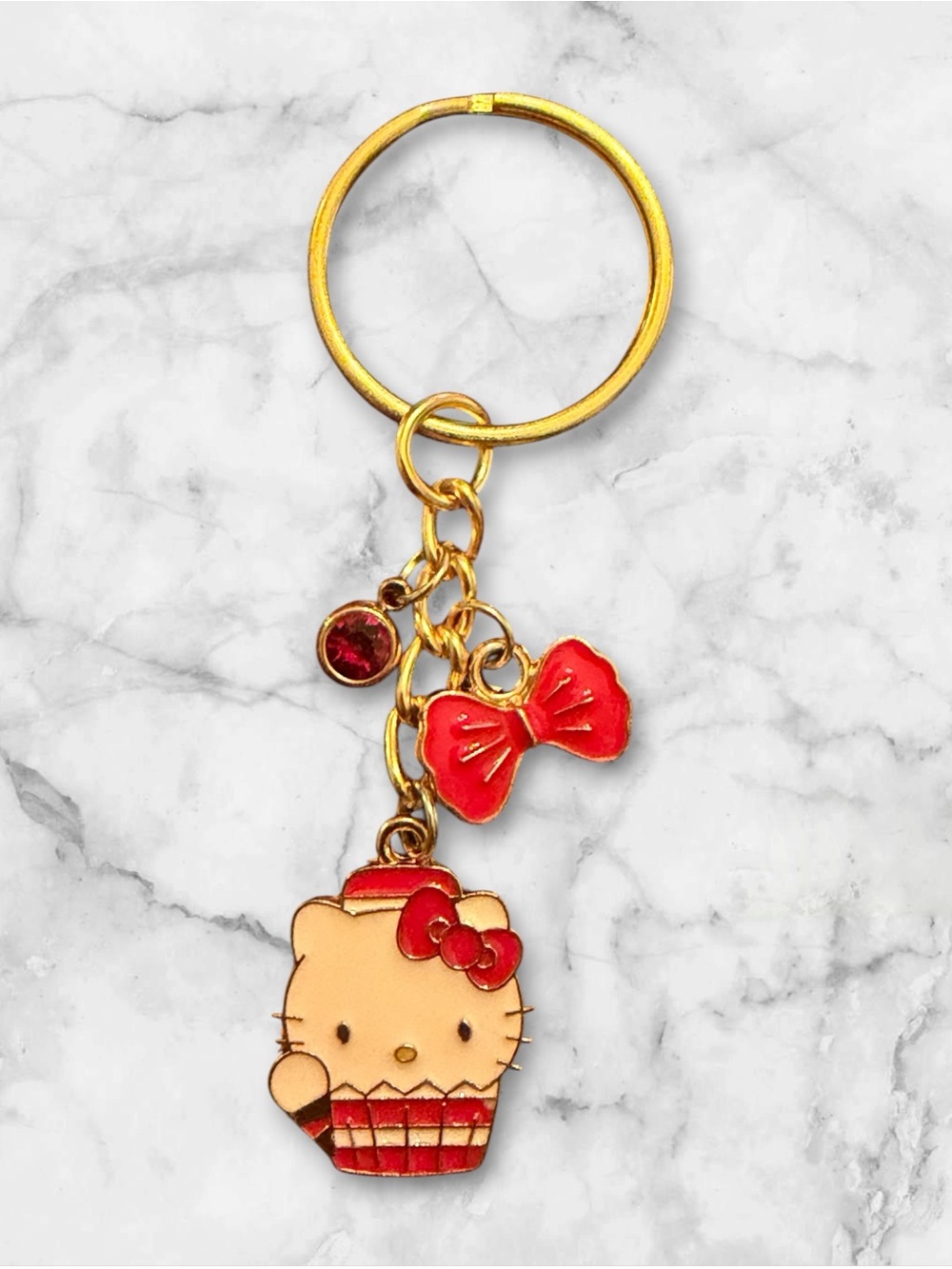 Hello Kitty Gold Tone Keychain with Red Accents